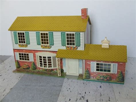 metal doll houses 1950s|tin doll houses from 1960s.